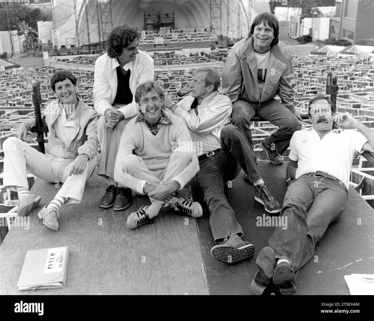 MICHAEL PALIN TERRY JONES ERIC IDLE GRAHAM CHAPMAN TERRY GILLIAM and JOHN CLEESE candid portrait in September 1980 during rehearsals / filming for MONTY PYTHON LIVE AT THE HOLLYWOOD BOWL 1982 director TERRY HUGHES and IAN MacNAUGHTON producer Terry Hughes executive producer George Harrison A Monty Python Begging Bowl Partnership film for HandMade Films Stock Photo