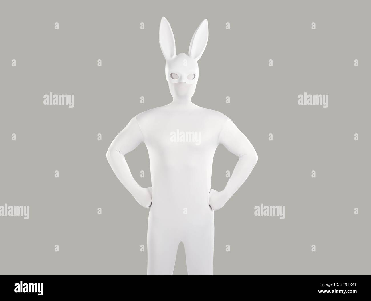 Portrait of unrecognizable person wearing white spandex costume and hare mask with long ears. Stock Photo