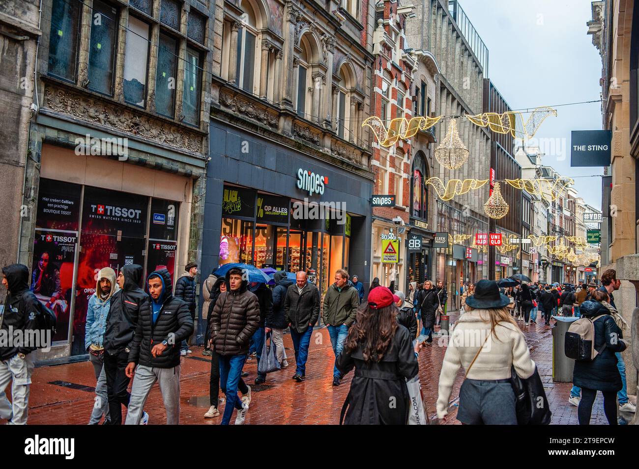 Amsterdam, Netherlands. 24th Nov, 2023. The streets are seen busy with people shopping in different stores. In Amsterdam, shops are ready with Black Friday deals, and the store windows are decorated with sales banners to attract people during Black Friday. Younger people, in particular, are waiting for the discount day after America's Thanksgiving to buy things. Credit: SOPA Images Limited/Alamy Live News Stock Photo