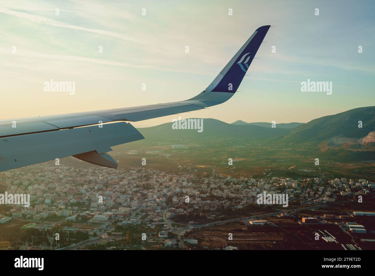 Athens, Greece - 14.06.2023: The wing of a Greek airline Aegean aircraft. Editorial Use. Stock Photo