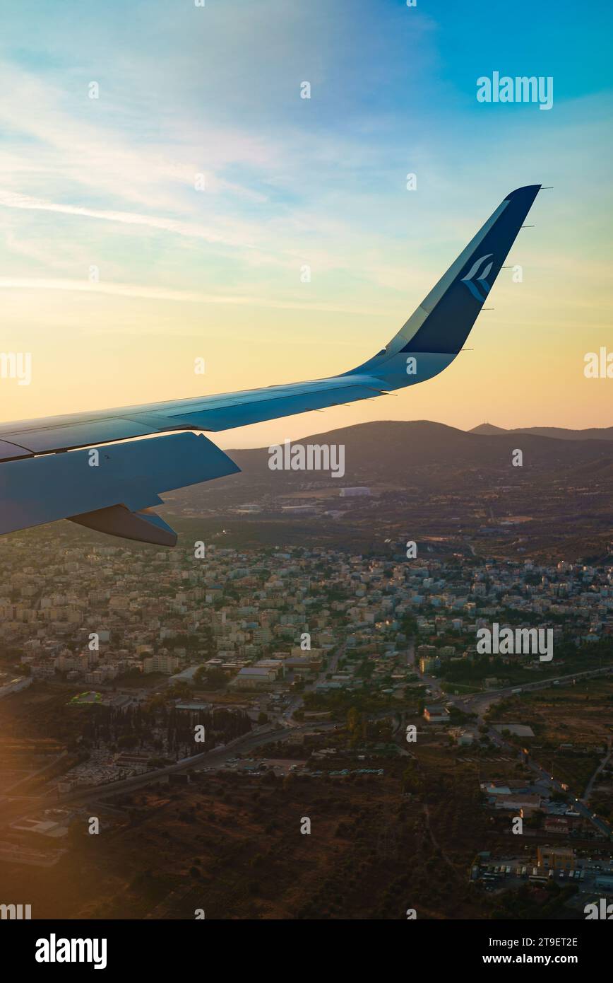 Athens, Greece - 14.06.2023: The wing of a Greek airline Aegean aircraft. Editorial Use. Stock Photo