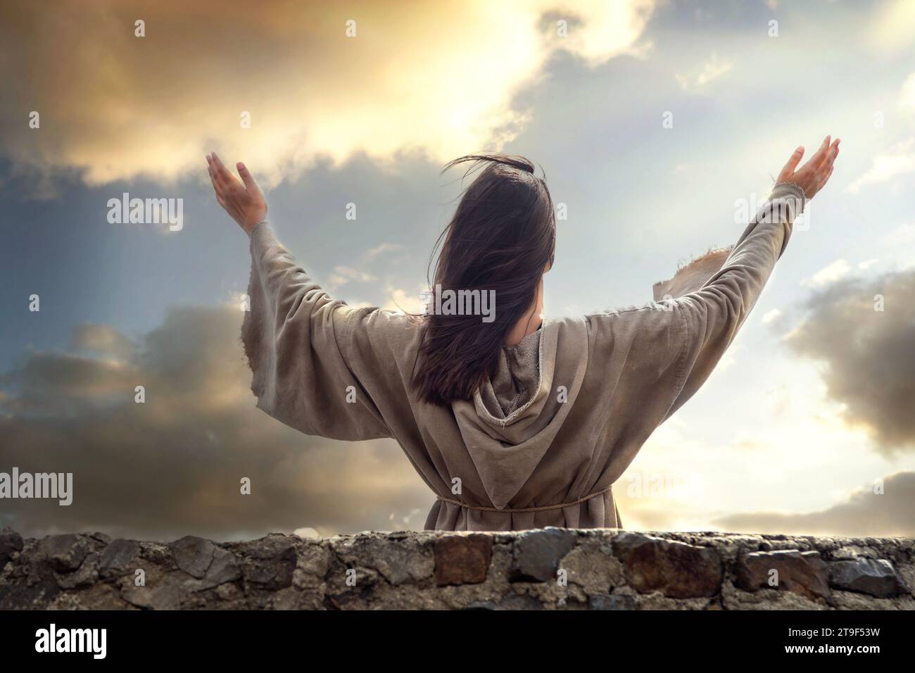 Spiritual morning greeting with arms spread to the sky Stock Photo Alamy