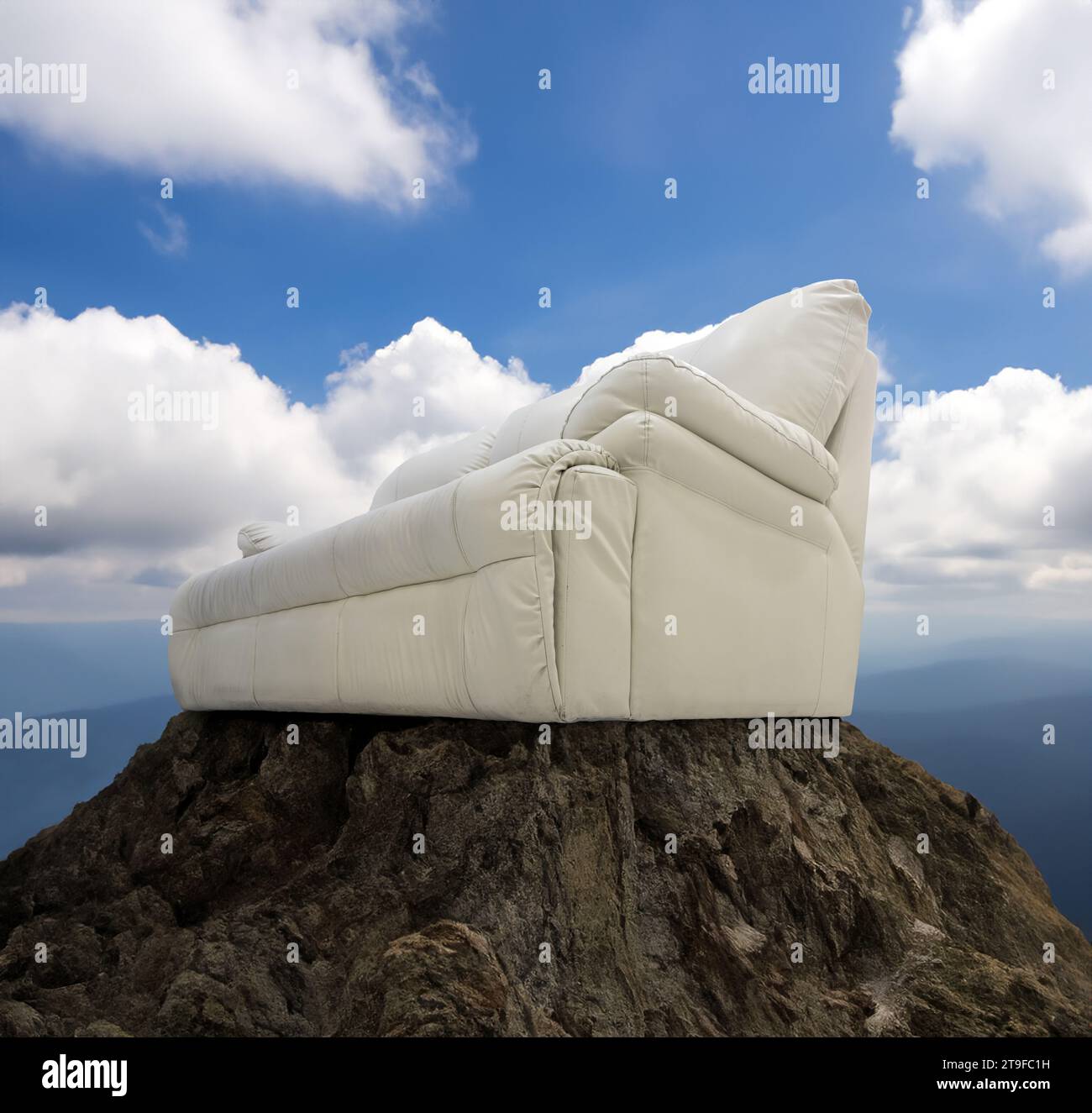 A luxury sofa on top of a mountain Stock Photo