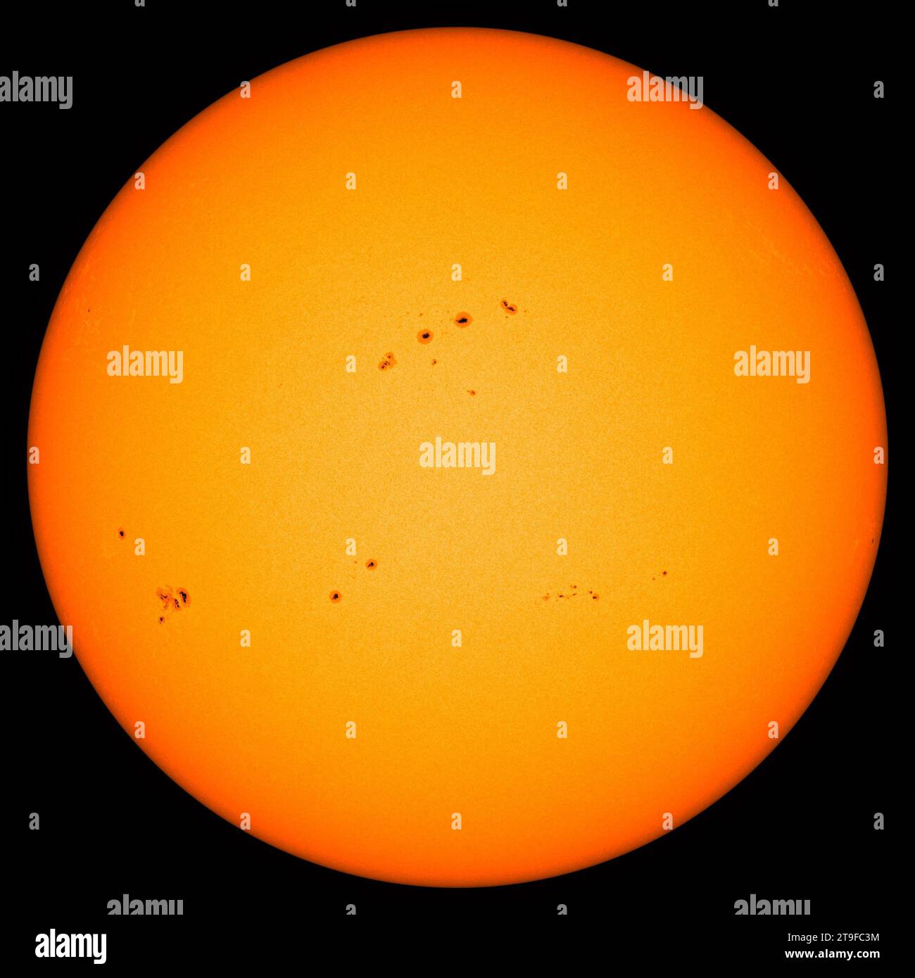 Detailed image of the sun where large groups of sunpots can be seen. Stock Photo