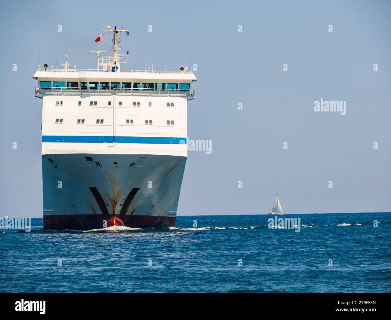 Valletta, Malta May 2021. A huge cargo ship enters the port of