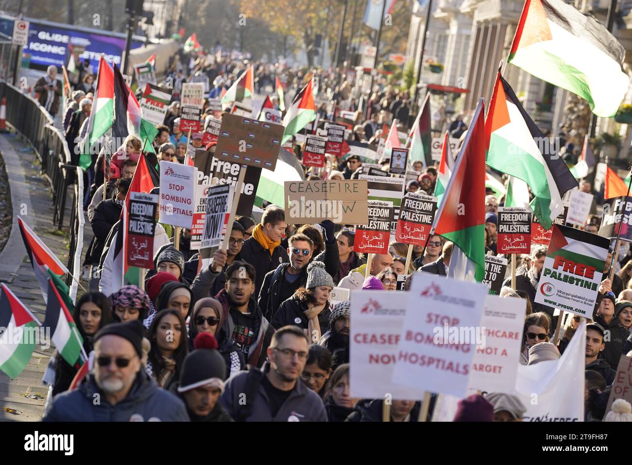 People take part in the National March for Palestine, organised by the