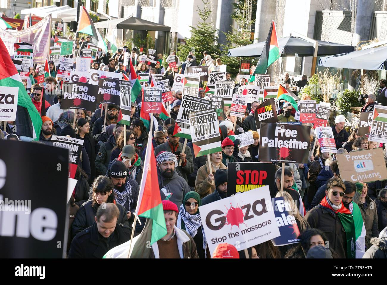 People take part in the National March for Palestine, organised by the