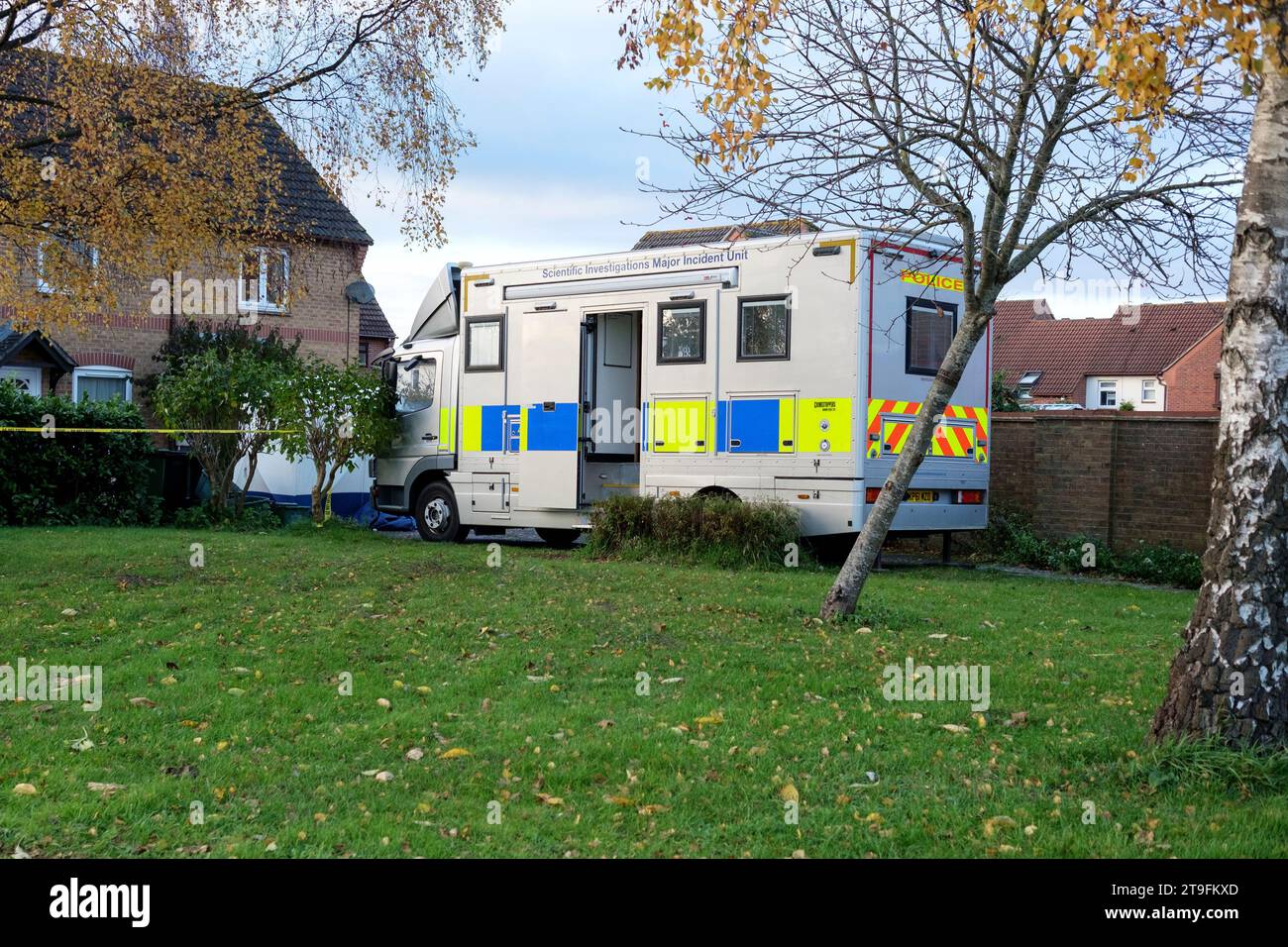 Police and scientific investigators attend an alleged muder scene at Honeysuckle close on 20th Noc 2023 Stock Photo