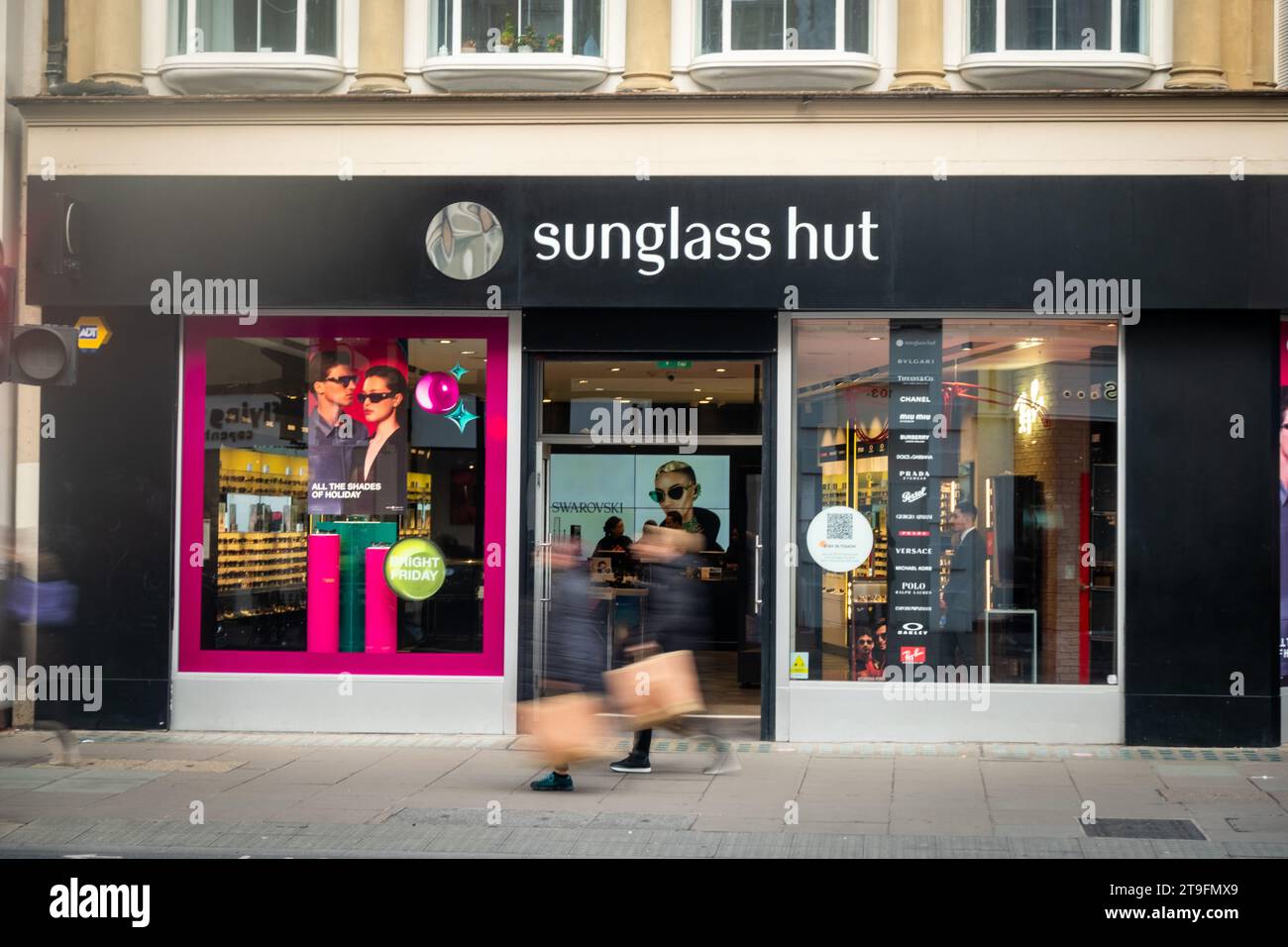 LONDON NOVEMBER 23, 2023 Sunglasses Hut, eyewear shop and motion