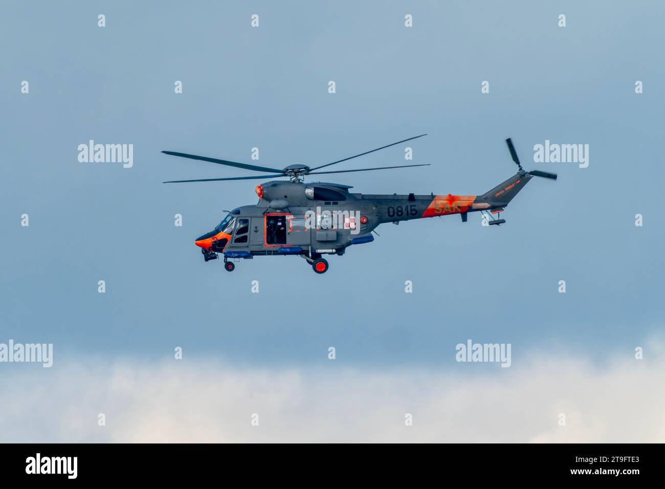 SAR rescue helicopter, gray helicopter of the rescue team in Poland, helicopter in action, rescue operation and search for missing persons search crew Stock Photo