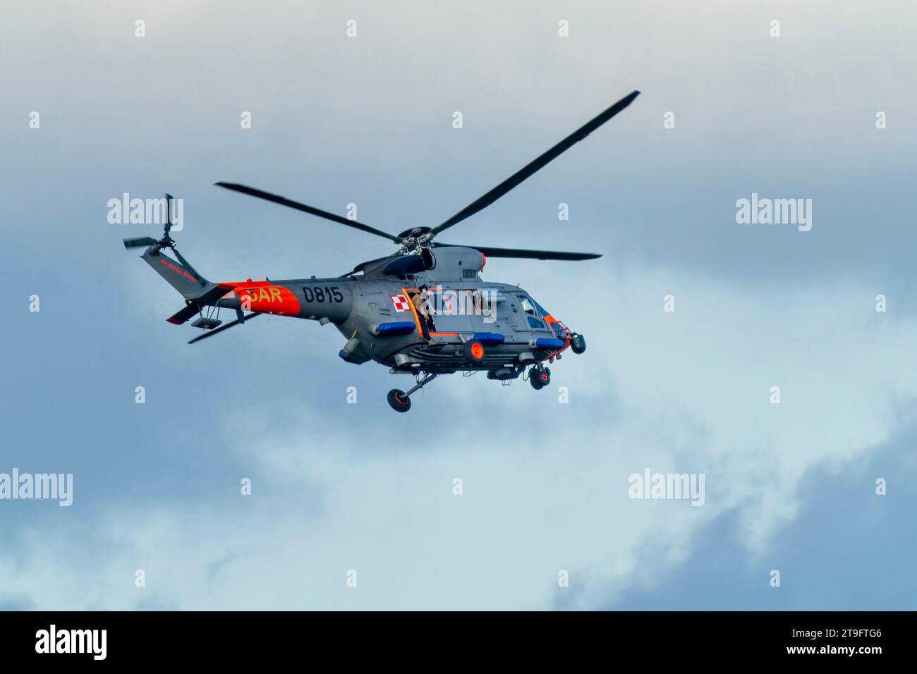 SAR rescue helicopter, gray helicopter of the rescue team in Poland, helicopter in action, rescue operation and search for missing persons search crew Stock Photo