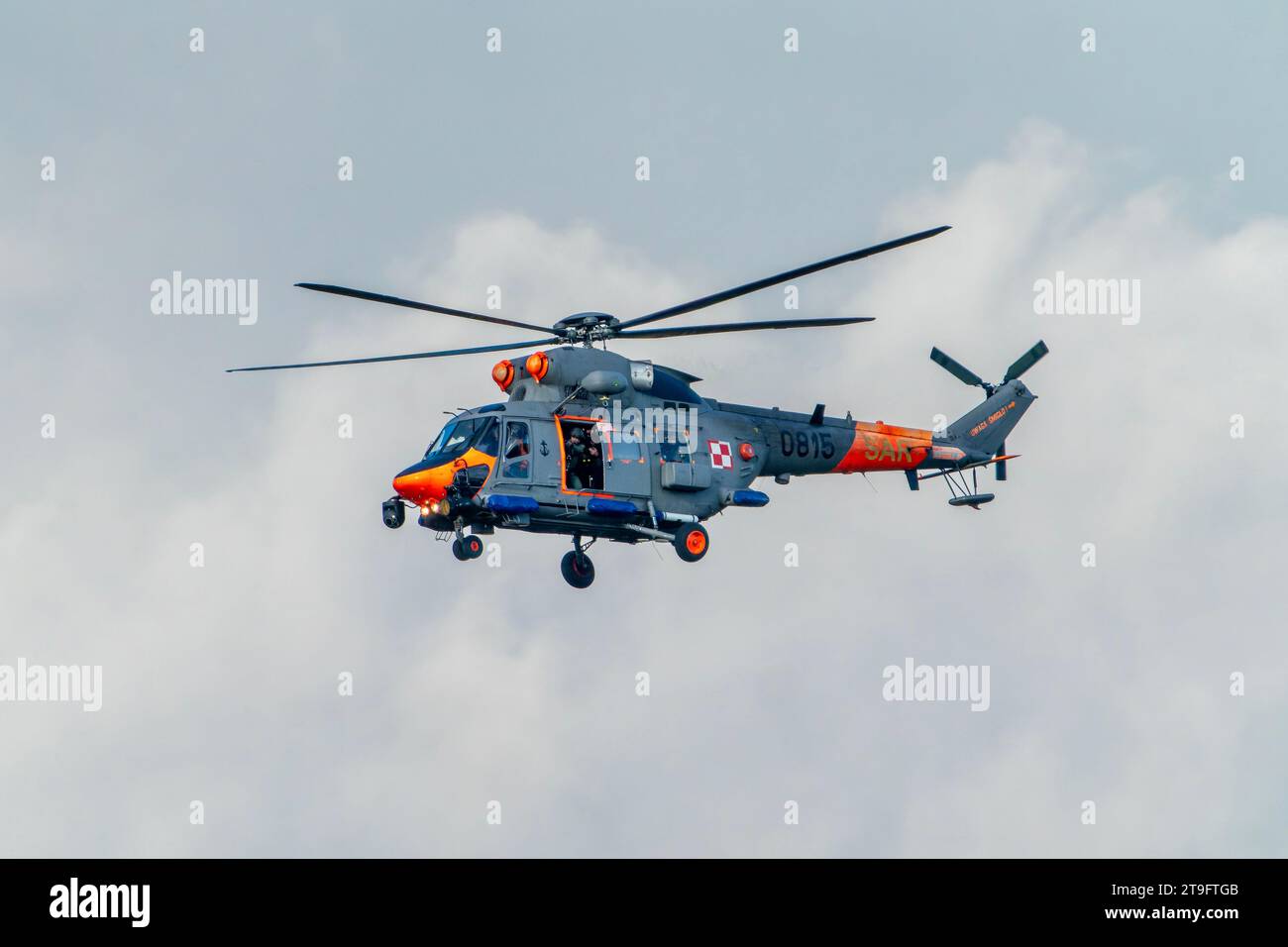 SAR rescue helicopter, gray helicopter of the rescue team in Poland, helicopter in action, rescue operation and search for missing persons search crew Stock Photo