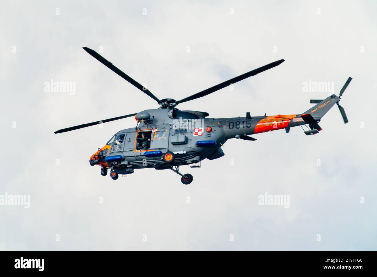 SAR rescue helicopter, gray helicopter of the rescue team in Poland, helicopter in action, rescue operation and search for missing persons search crew Stock Photo