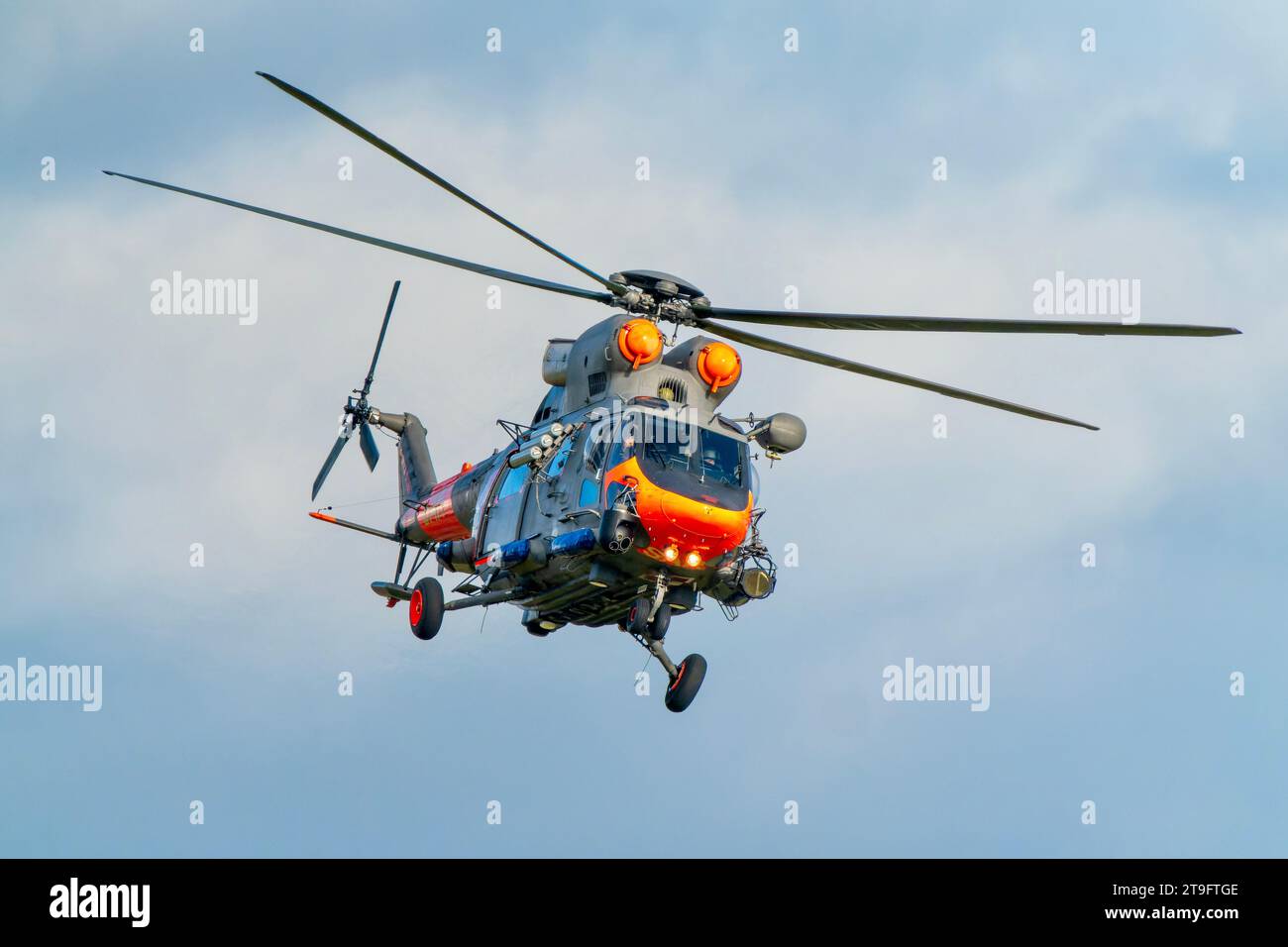 SAR rescue helicopter, gray helicopter of the rescue team in Poland, helicopter in action, rescue operation and search for missing persons search crew Stock Photo
