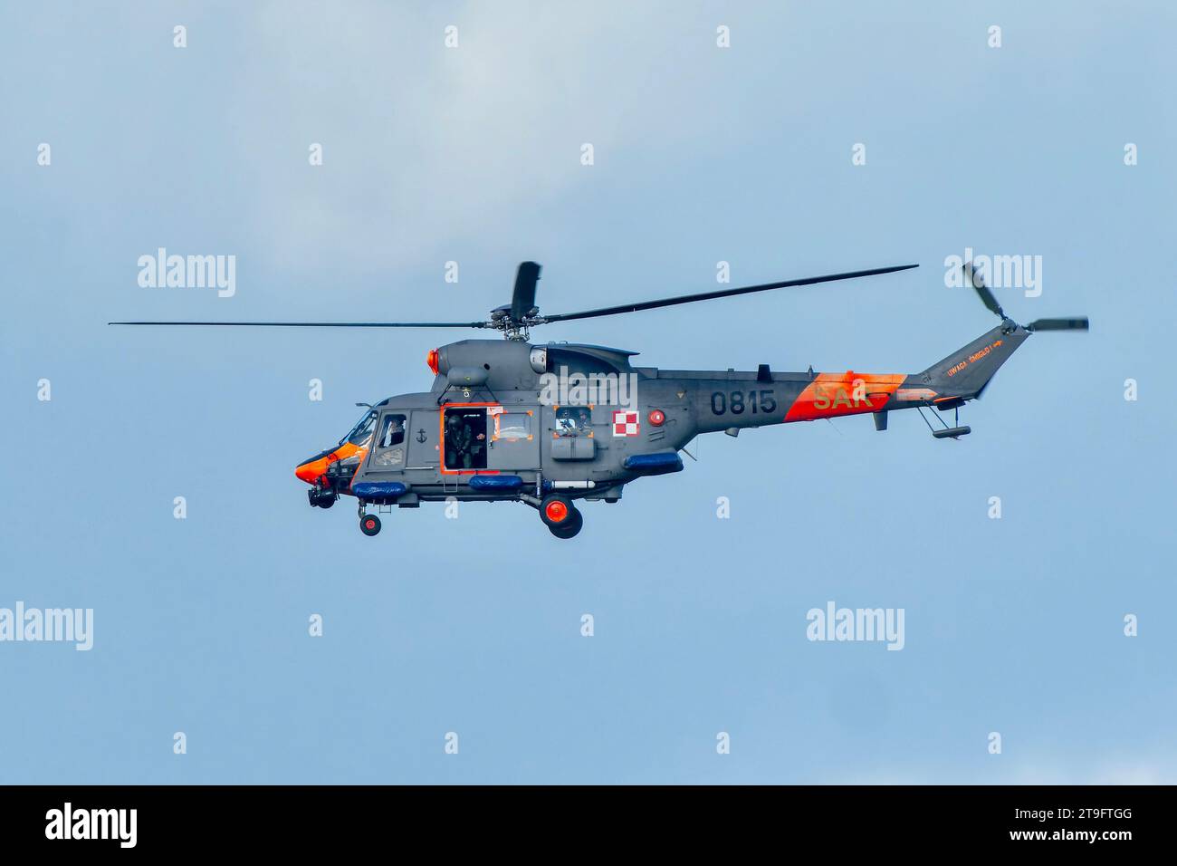SAR rescue helicopter, gray helicopter of the rescue team in Poland, helicopter in action, rescue operation and search for missing persons search crew Stock Photo