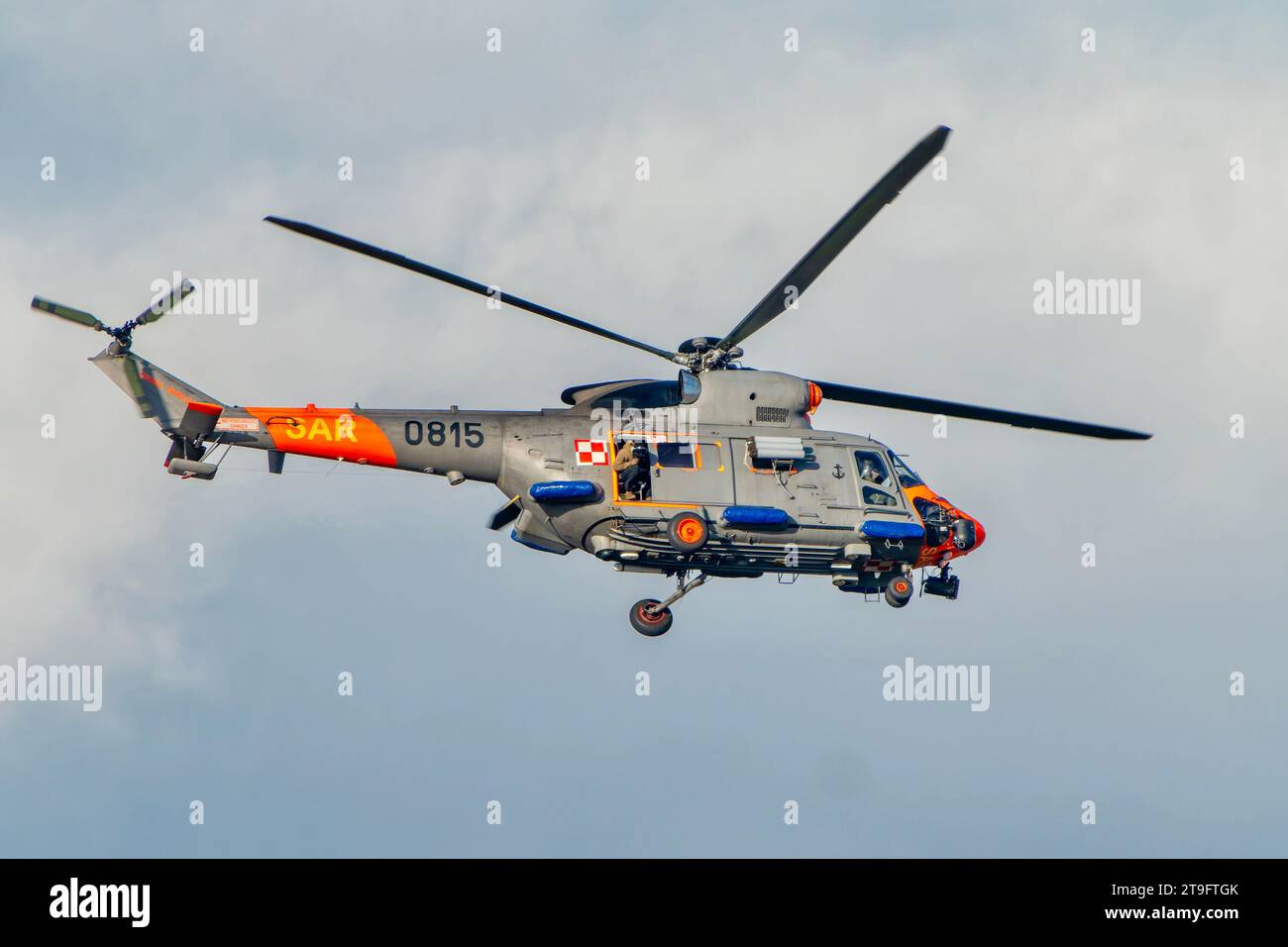 SAR rescue helicopter, gray helicopter of the rescue team in Poland, helicopter in action, rescue operation and search for missing persons search crew Stock Photo