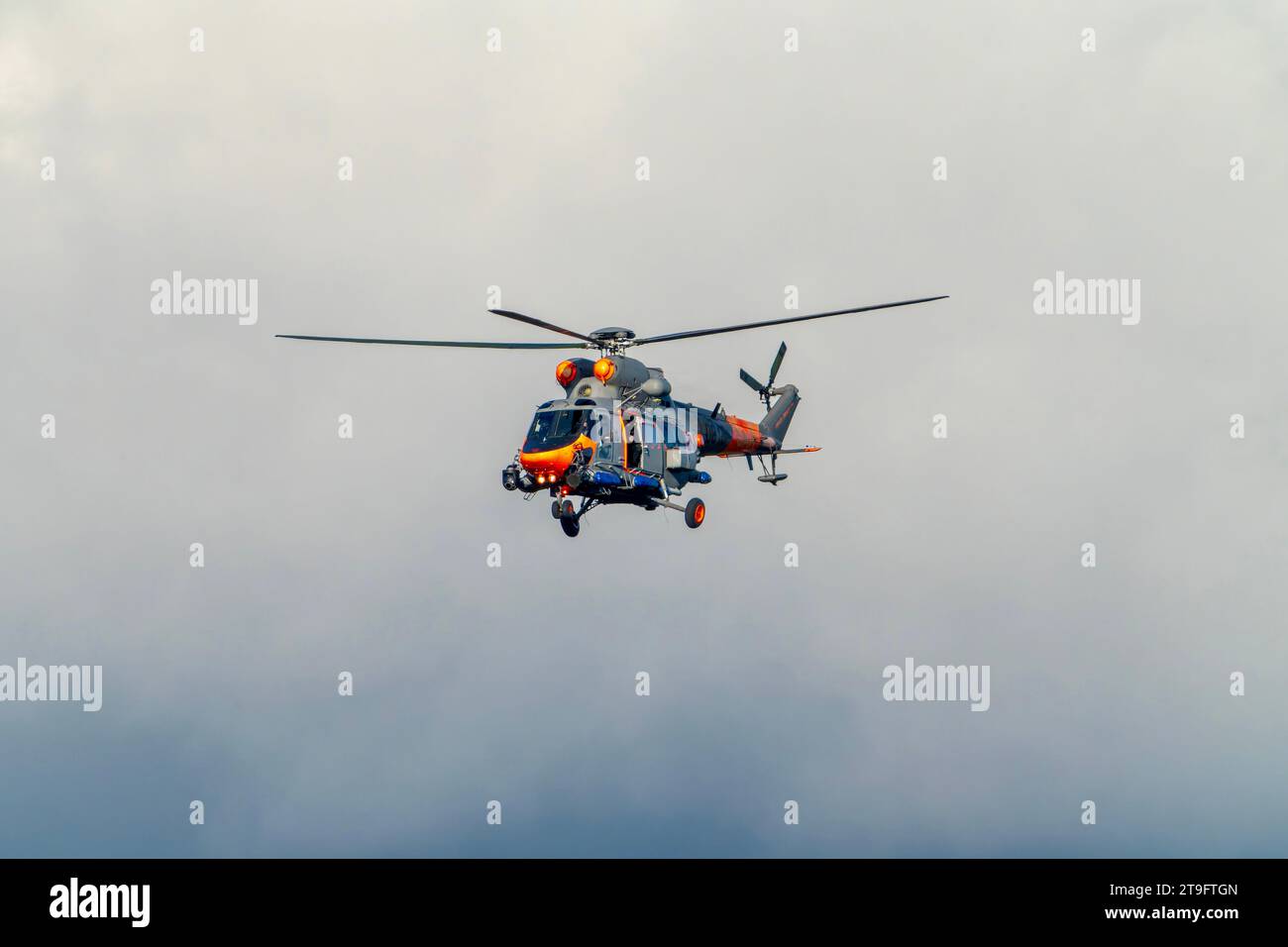 SAR rescue helicopter, gray helicopter of the rescue team in Poland, helicopter in action, rescue operation and search for missing persons search crew Stock Photo