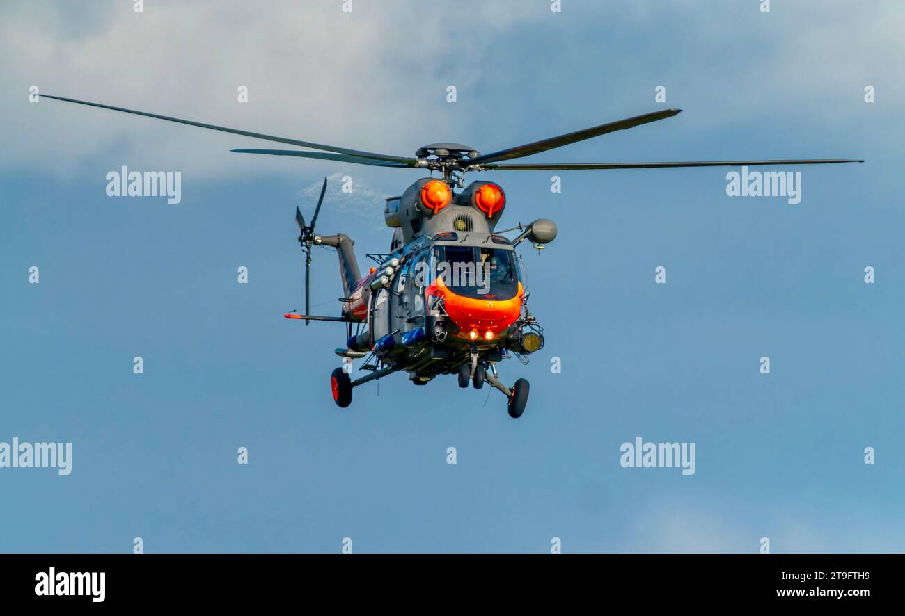 SAR rescue helicopter, gray helicopter of the rescue team in Poland, helicopter in action, rescue operation and search for missing persons search crew Stock Photo