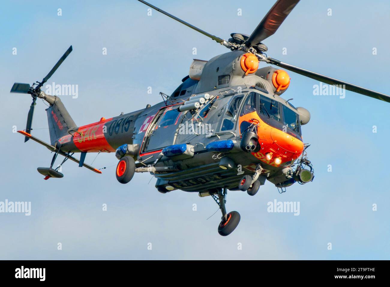 SAR rescue helicopter, gray helicopter of the rescue team in Poland, helicopter in action, rescue operation and search for missing persons search crew Stock Photo