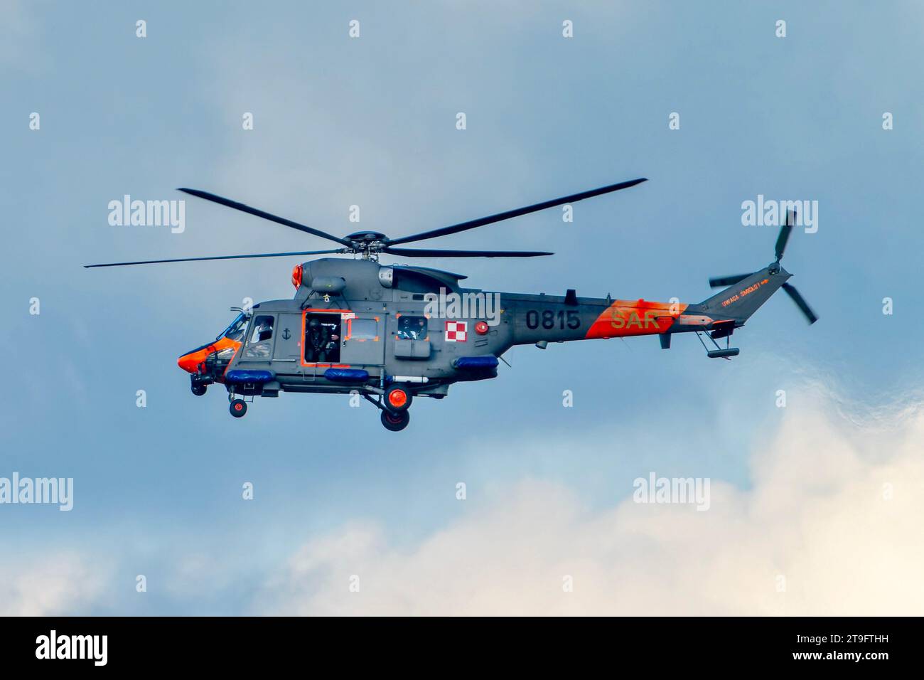 SAR rescue helicopter, gray helicopter of the rescue team in Poland, helicopter in action, rescue operation and search for missing persons search crew Stock Photo