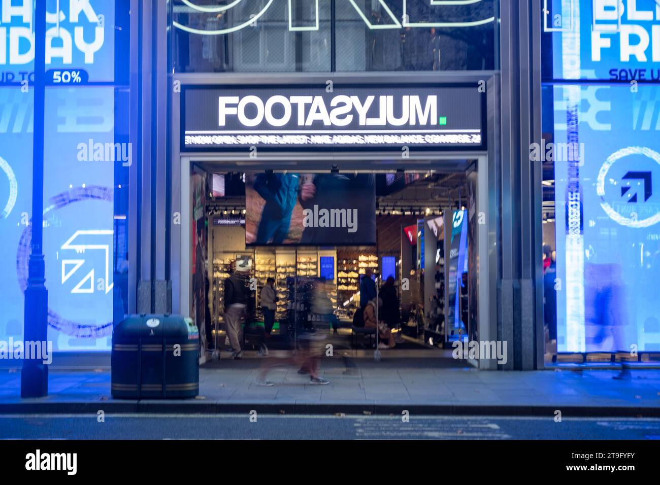 LONDON NOVEMBER 23, 2023 Footasylum shoe shop and motion blurred