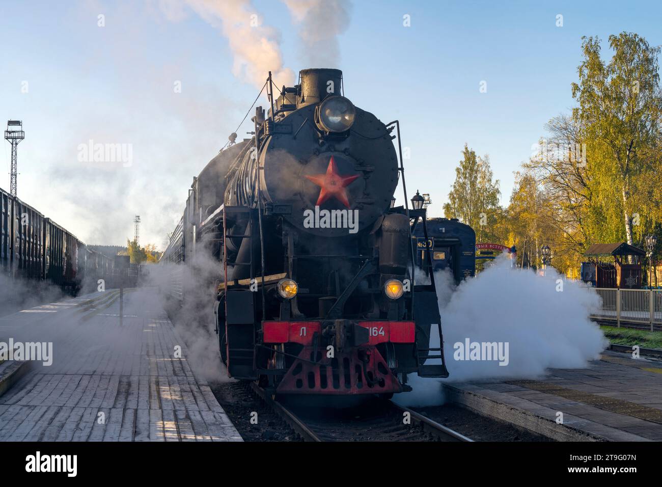 SORTAVALA, RUSSIA - OCTOBER 06, 2023: Old Soviet steam locomotive L-5164 with the Ruskeala Express train on the Sortavala station on a sunny October m Stock Photo