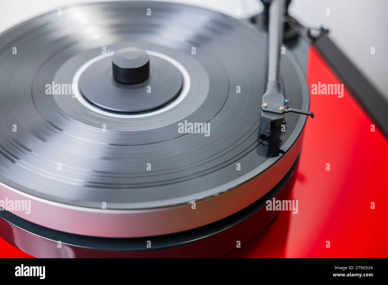 Vinyl record spins on HiFi turntable, sparking nostalgia with its
