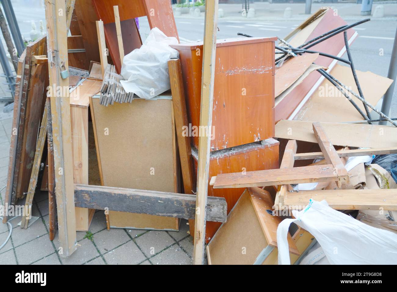 Wooden garbage left on the sidewalk, garbage collection, garbage