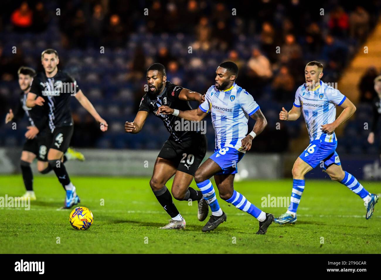 Emile Acquah (20 Barrow) and Mandela Egbo (18 Colchester United)challenge for the ball during the Sky Bet League 2 match between Colchester United and Barrow at the Weston Homes Community Stadium, Colchester on Saturday 25th November 2023. (Photo: Kevin Hodgson | MI News) Credit: MI News & Sport /Alamy Live News Stock Photo
