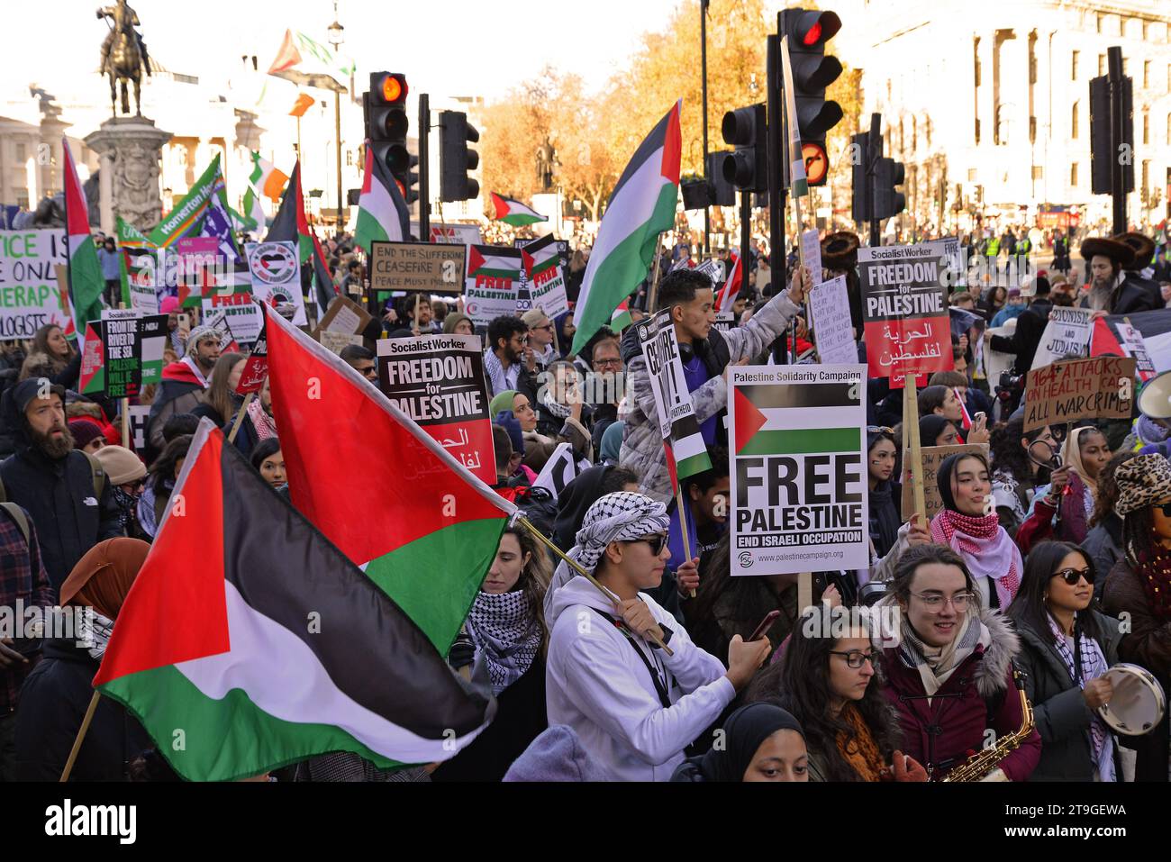 London, UK. 25th Nov, 2023. Pro-Palestinian demonstators march past London's Trafalgar Square and on to Whitehall in protest against the Israeli bombing of Gaza. London. 25th November 2023. Credit: Mark York/Alamy Live News Stock Photo