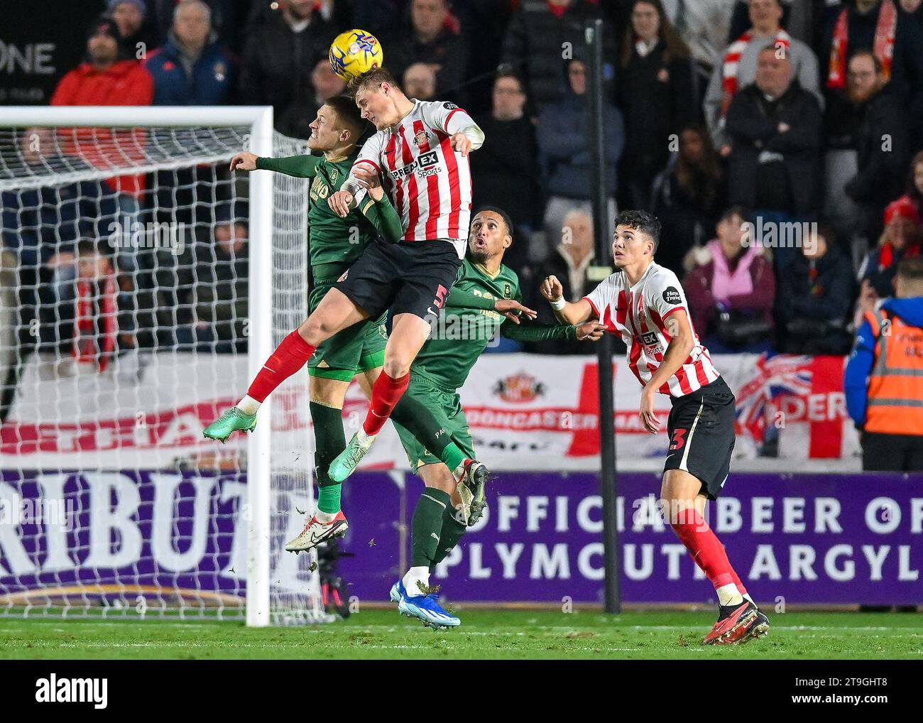Lewis Gibson #17 of Plymouth Argyle battles in the air during the Sky ...