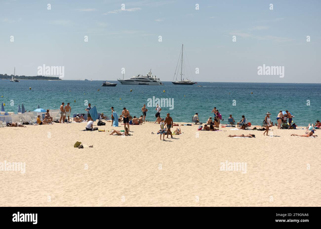 Cannes, France - June 21, 2019: People rest on the beach of the Cannes. Stock Photo