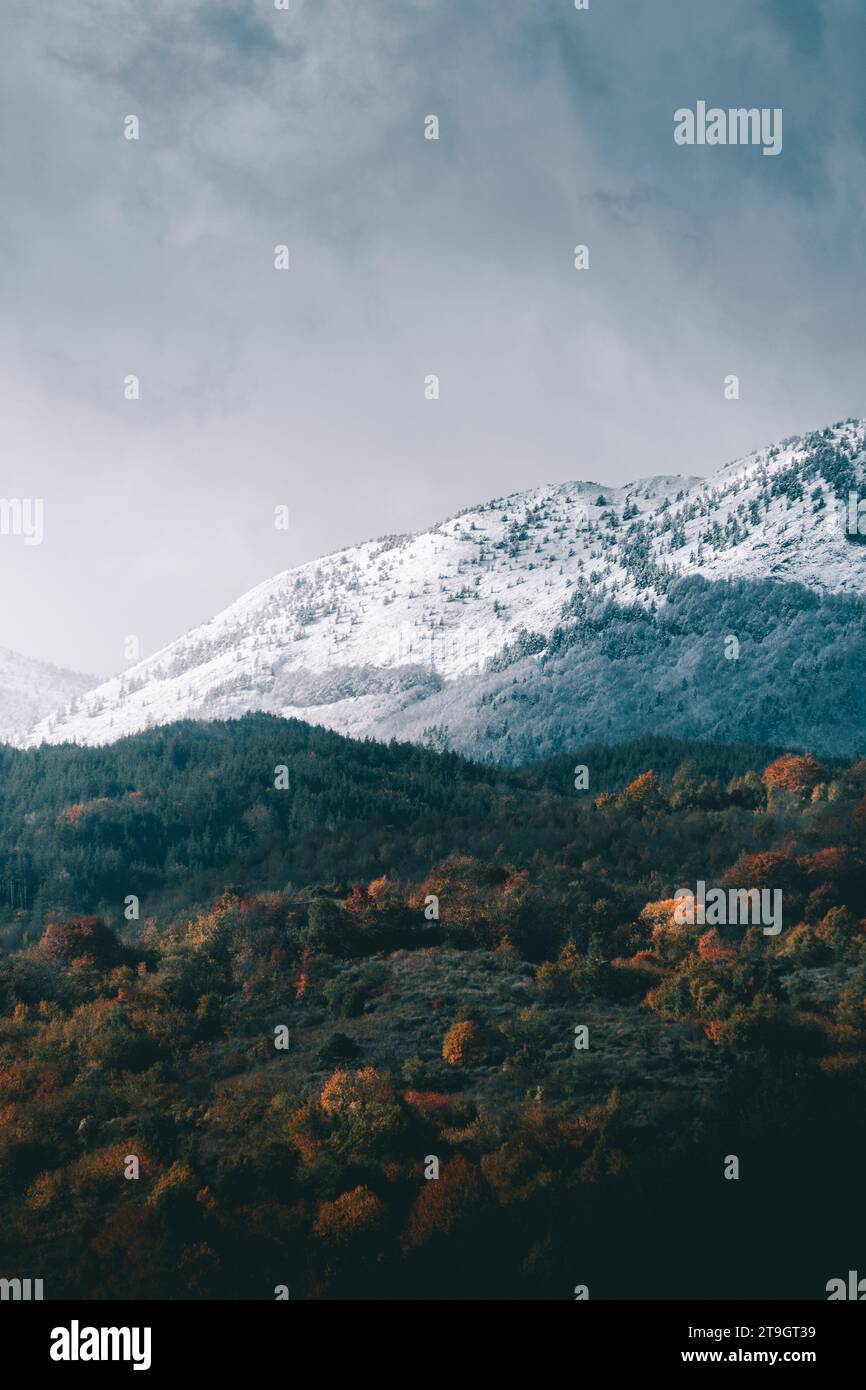 Transition form autumn to winter in the mountains Stock Photo - Alamy