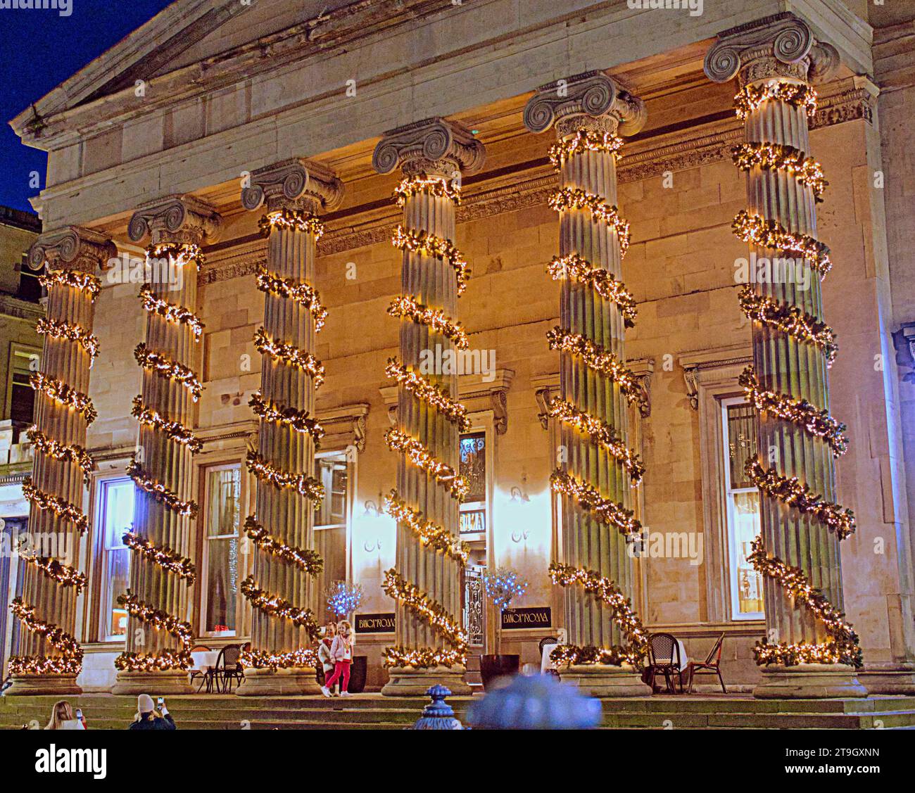 Glasgow, Scotland, UK. 24th November, 2023. Banco roma in royal exchange square. George Square Winterfest chaos as the event that was supposed to open at 4pm was late as electricals were bot ready and the Winterfest sign was only a fest as staff scurried in the background massive crowds wee behind metal barriers with cold kids as the queues stretched around the square. A similar event in st enoch square also suffered the same problem Credit Gerard Ferry/Alamy Live News Stock Photo