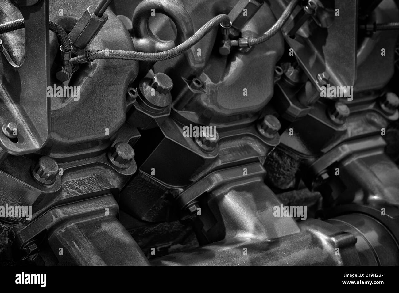 Black diesel engine. Fragment of a diesel motor close-up. Selective on the fuel injection in the the diesel engine. supply system for diesel fuel.  En Stock Photo