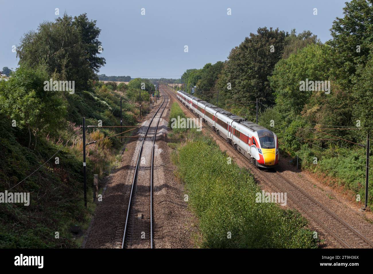 LNER class 801 Azuma train on the electrified east coast mainline passing Fitzwilliam, Yorkshire Stock Photo