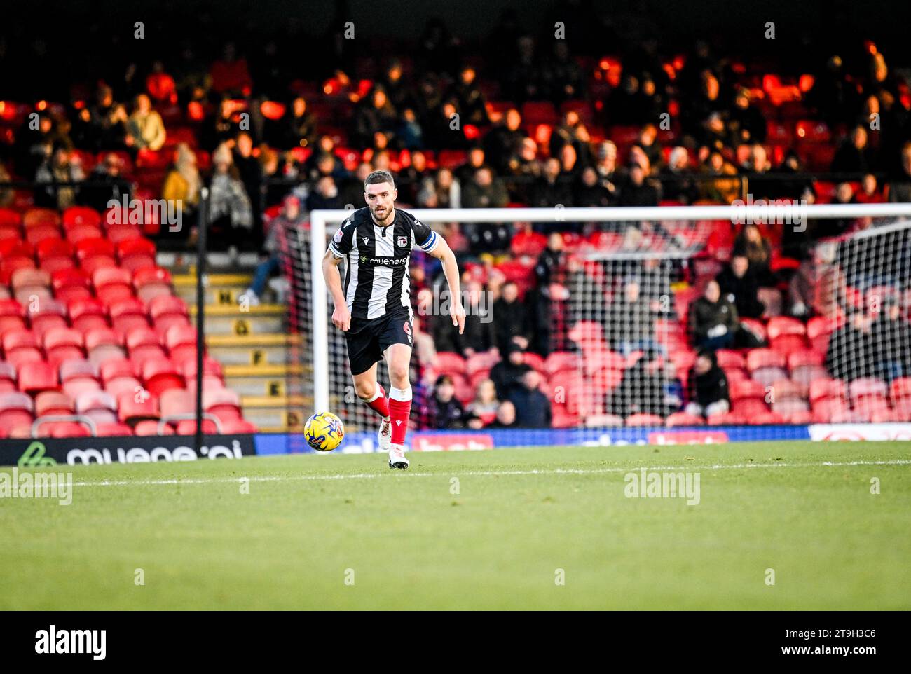 Cleethorpes, UK, 24th November, 2023.  Luke Waterfall during the Sky Bet EFL League Two football match between Grimsby Town FC and Sutton United FC at Blundell Park, Cleethorpes, UK.Credit: Jon Corken/Alamy Live News Stock Photo