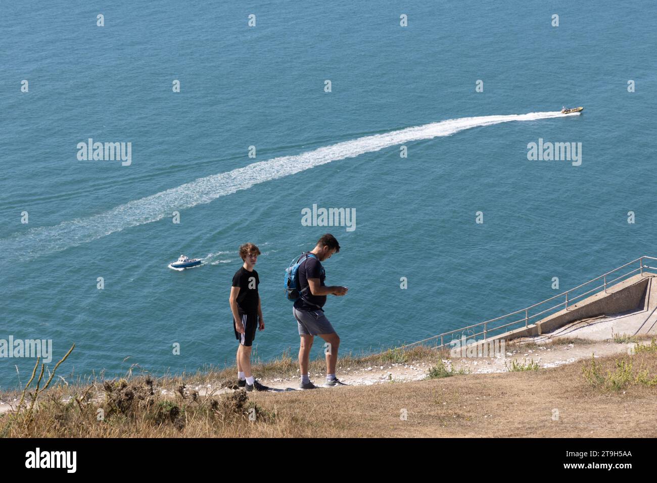 Hikers on Tennyson Down on the Isle of Wight, England Stock Photo