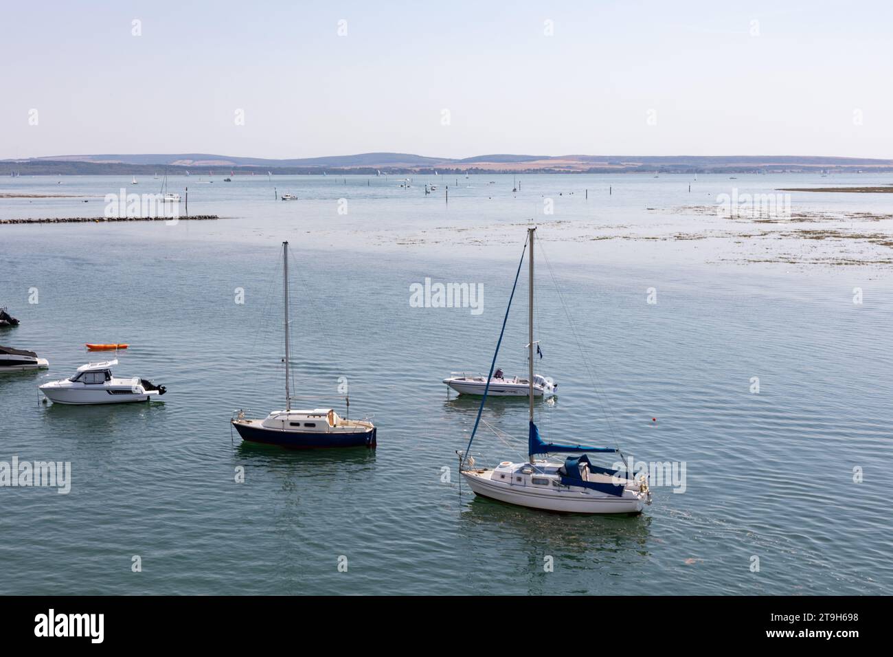 Sailing boats moored on The Solent near Lymington in Hampshire Stock Photo