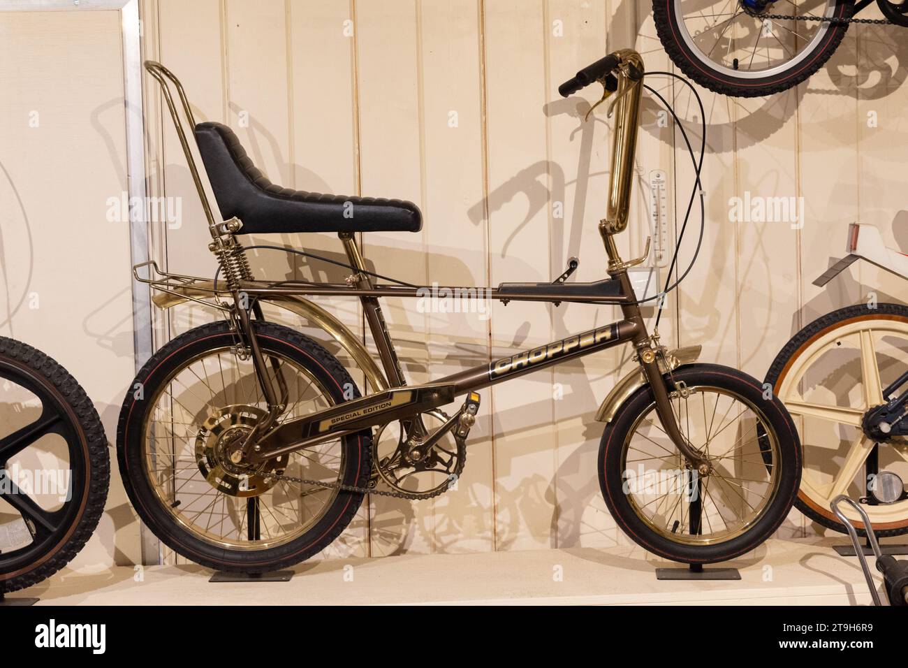 2015 Raleigh Chopper, Gold Special Edition, at Brooklands museum, Weybridge, Surrey, UK Stock Photo