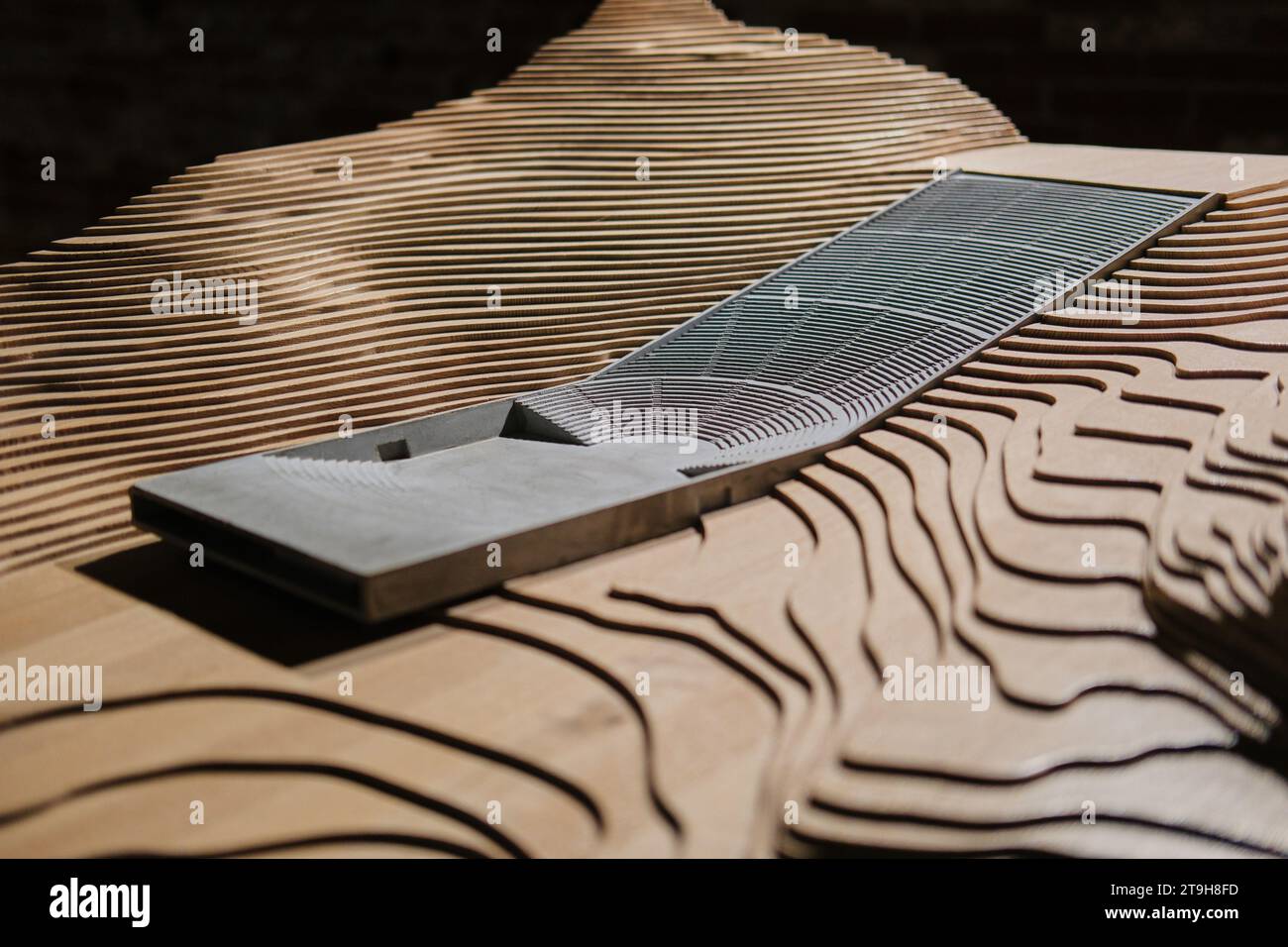 Wood & concrete architectural model designed by ZAO Standard Architecture, in Arsenale building, Venice Architecture Biennale 2023 Stock Photo