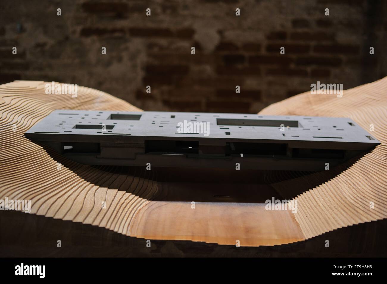 Wood and concrete architectural model designed by ZAO Standard Architecture, in Arsenale building, Venice Architecture Biennale 2023 Stock Photo