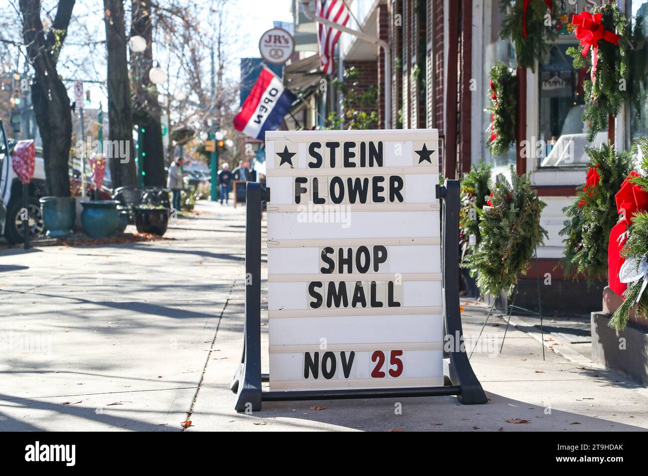 Lewisburg, United States. 25th Nov, 2023. A sign outside of Stein's Flower and Gifts encourages people to shop small during the 14th annual Small Business Saturday on November 25, 2023 in Lewisburg, Pennsylvania. (Photo by Paul Weaver/Sipa USA) Credit: Sipa USA/Alamy Live News Stock Photo