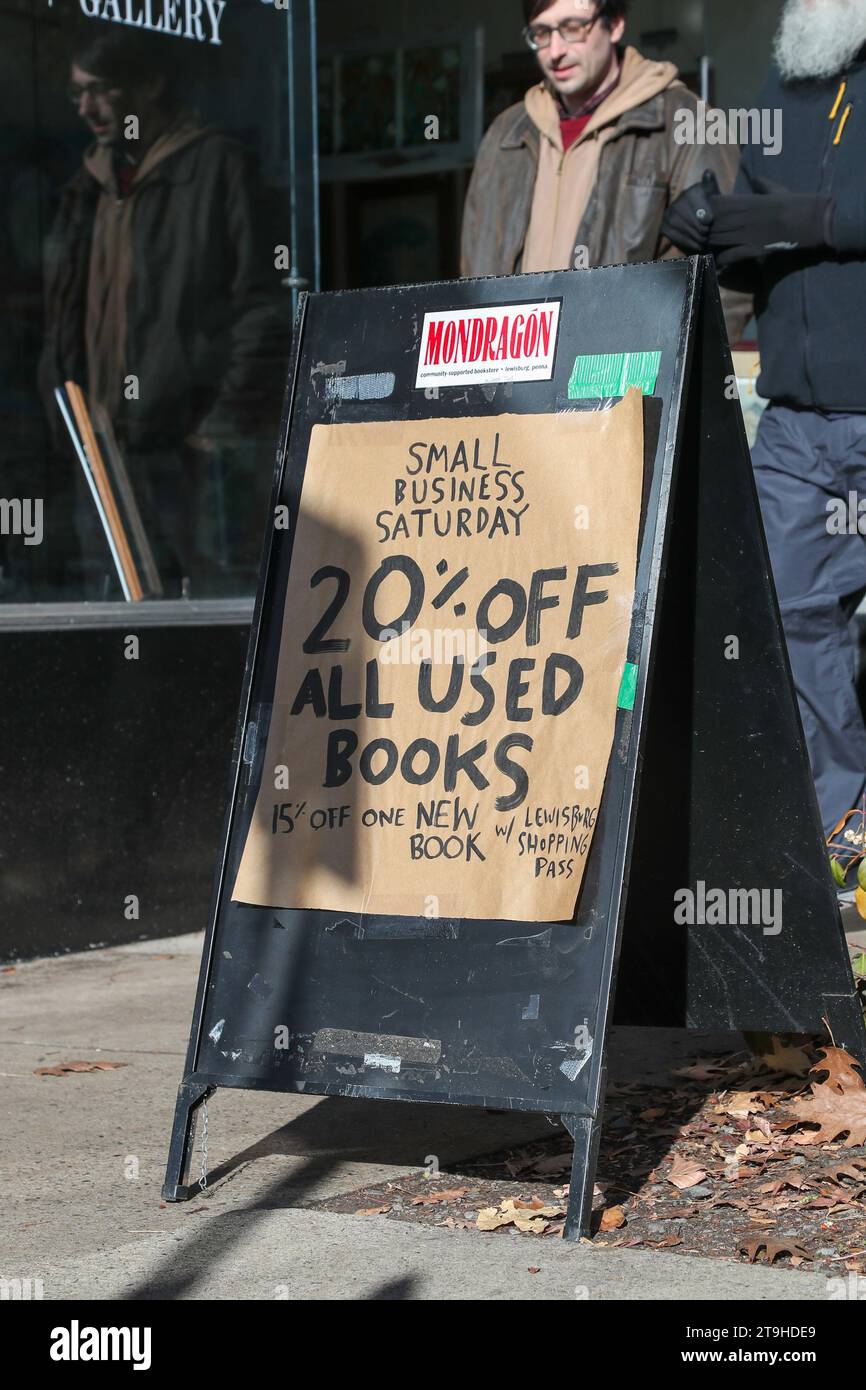 Lewisburg, United States. 25th Nov, 2023. A sign outside of Mondragon Books advertises its Small Business Saturday discount on November 25, 2023 in Lewisburg, Pennsylvania. (Photo by Paul Weaver/Sipa USA) Credit: Sipa USA/Alamy Live News Stock Photo