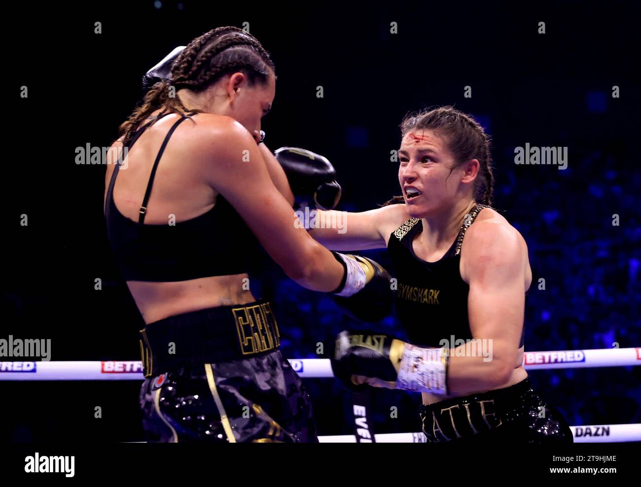 Katie Taylor (right) and Chantelle Cameron in action during their