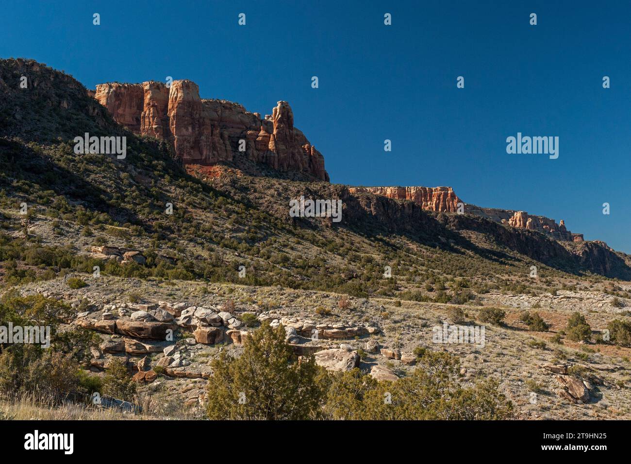 The four primary rock layers of the Colorado National Monument, as seen from the Liberty Cap trail. Stock Photo