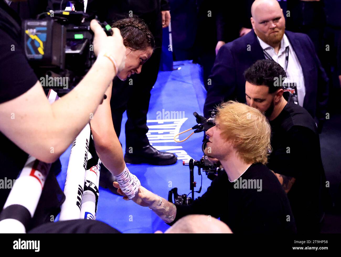 Katie Taylor speaks to Ed Sheeran after winning her Undisputed Super