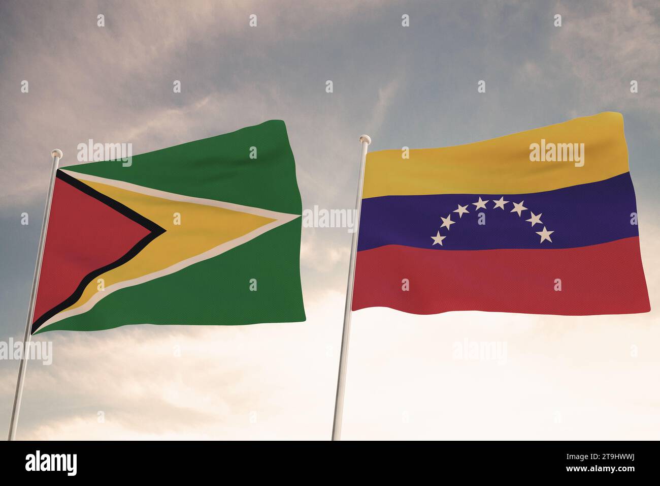 SPECTACULAR FLAGS OF GUYANA AND VENEZUELA WAVING WITH A BLUE SKY BACKGROUND CONFLICT RELATIONSHIPS Stock Photo