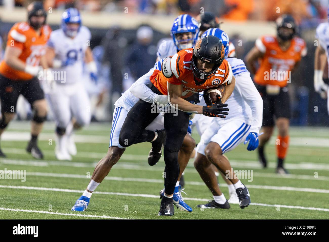 BYU cornerback Kamden Garrett (7) tackles Oklahoma State wide receiver