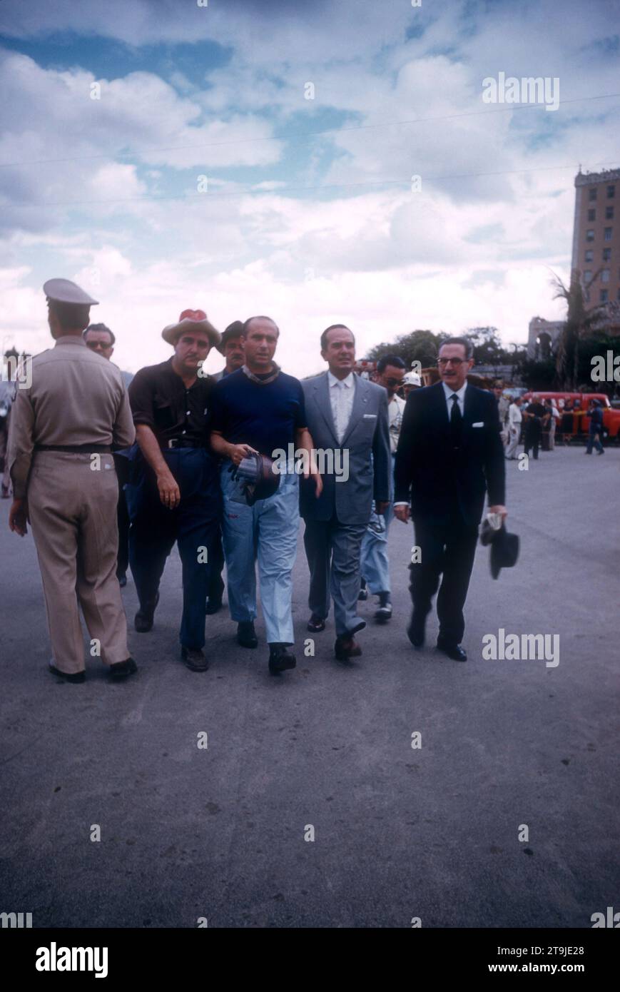 HAVANA, CUBA - FEBRUARY 24:  Juan Manuel Fangio (1911-1995) driver of the Maserati 300S walks on the course after the 1957 Cuban Grand Prix on February 24, 1957 in Havana, Cuba.  Fangio won the race.  (Photo by Hy Peskin) *** Local Caption *** Juan Manuel Fangio Stock Photo